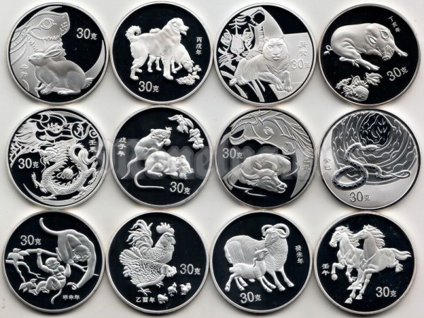 Китай набор из 12-ти монетовидных жетонов 2002-2013 годы лунный календарь PROOF