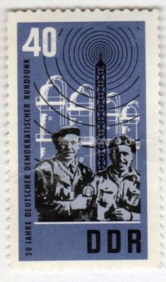 марка ГДР 40 пфенниг "Workers with microphone, transmitter mast, chemical plant" 1965 год Гашение